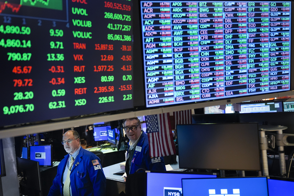 Traders work the floor of the New York Stock Exchange.