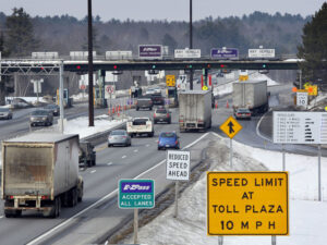 Traffic approaches Maine Turnpike toll booths in Gardiner, Maine, in February 2011.