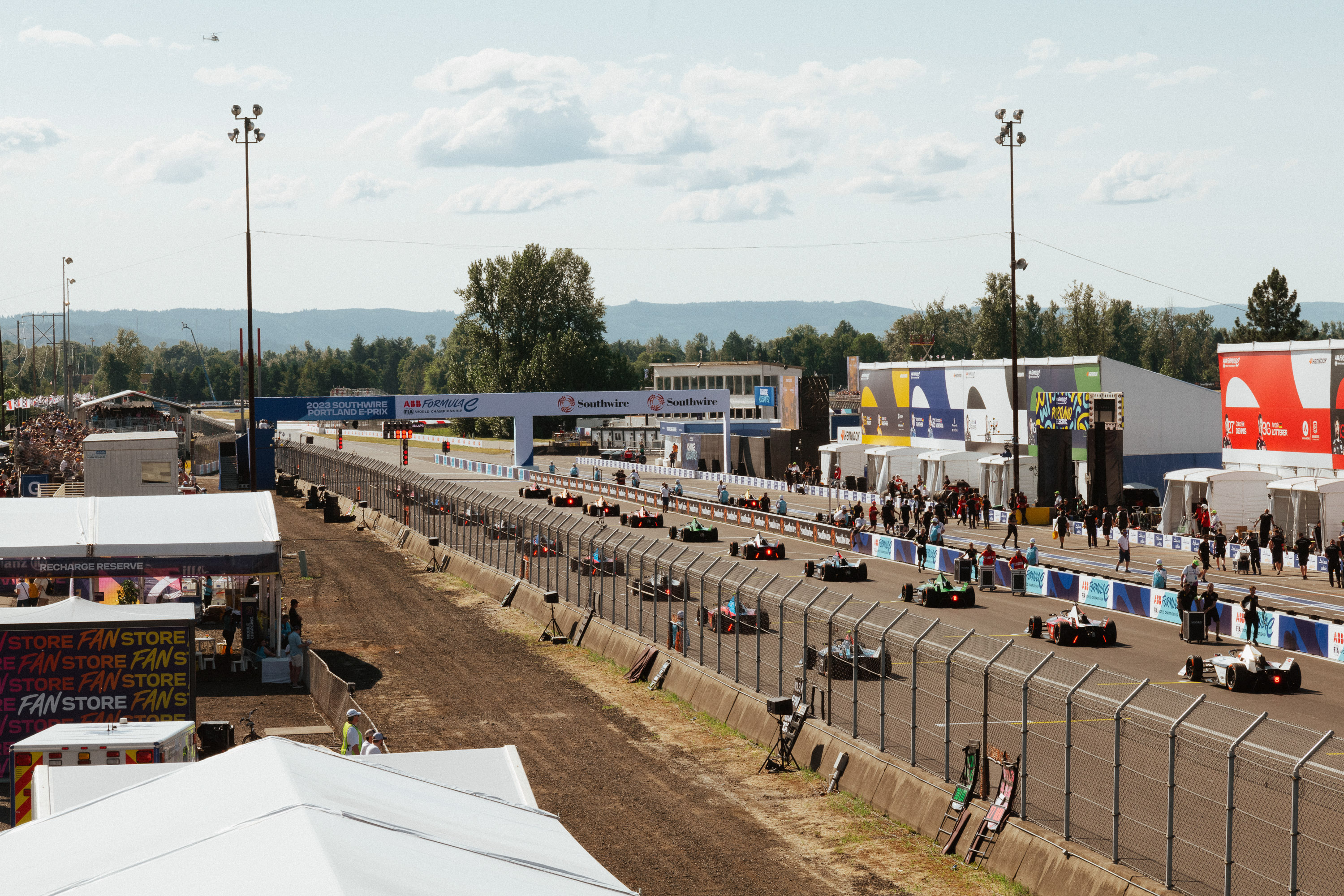 Racers line up for the start of a Formula-E race at Portland International Raceway.