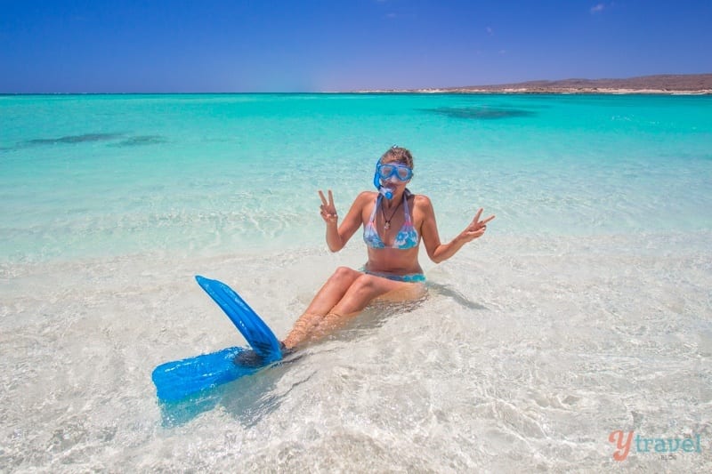 caz lying in water with snorkel gear on