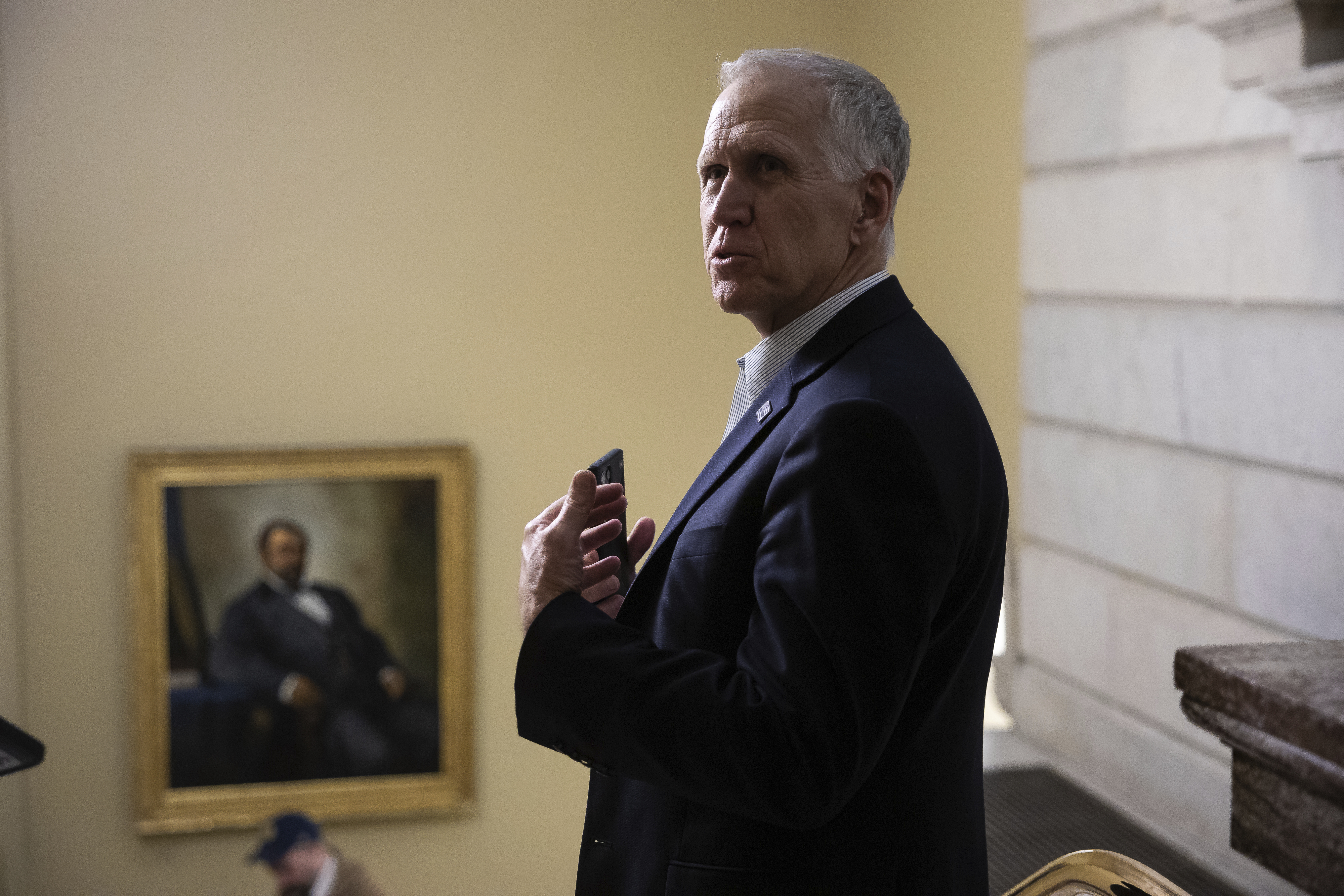 Sen. Thom Tillis speaks with reporters.